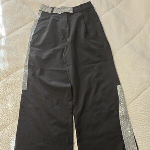 Akira black dress pants with geometric silver accents, size small